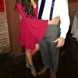 Red long sleeve TCEC dress with flare sleeves